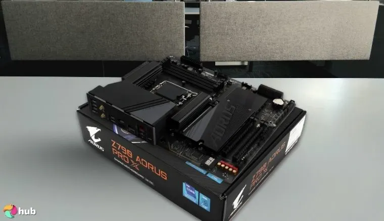 GIGABYTE Z790 AORUS PRO X Motherboard on a white office desk in a top-down view for a review