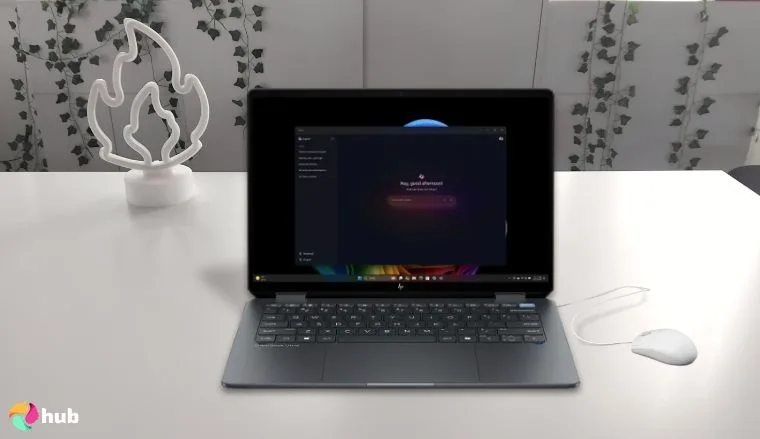HP OmniBook Ultra Flip Laptop on a white office desk prepared for testing shots