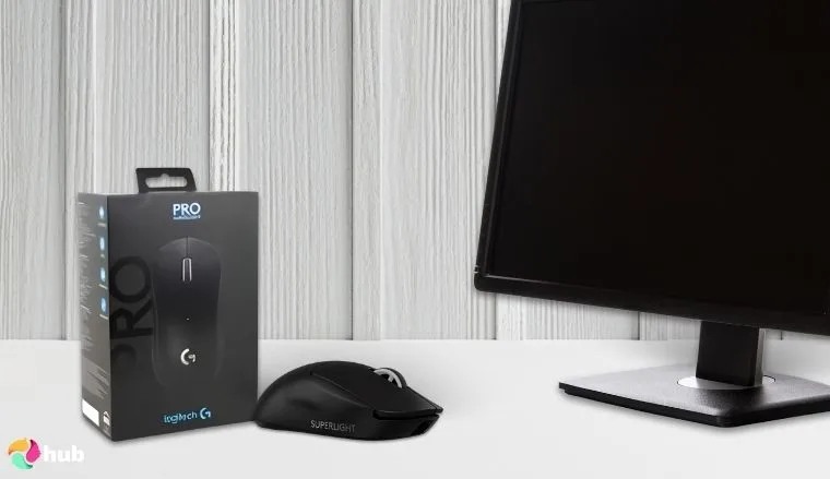 Logitech G Pro x Superlight Gaming Mouse on a white office desk photographed for a review
