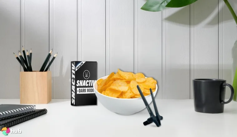 Snactiv Pro Finger Chopsticks on a white office desk set up for testing and review