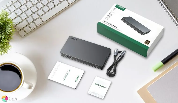 UGREEN 9-in-1 Steam Deck Dock on a white office desk with creative arrangement for a review