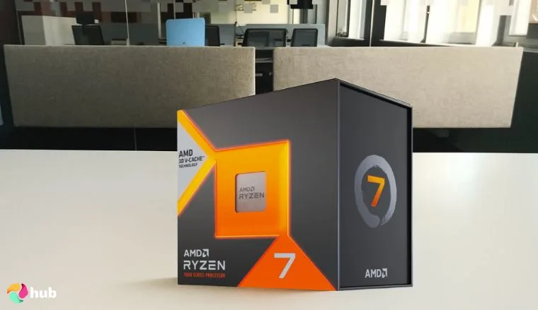AMD Ryzen 7 7800X3D AMD CPU on a white office desk with natural shadows for a review