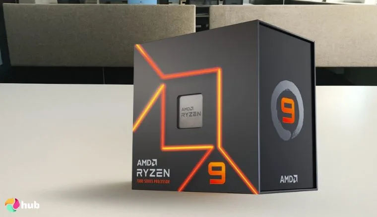 AMD Ryzen 9 7900X CPU on a white office desk positioned for photography