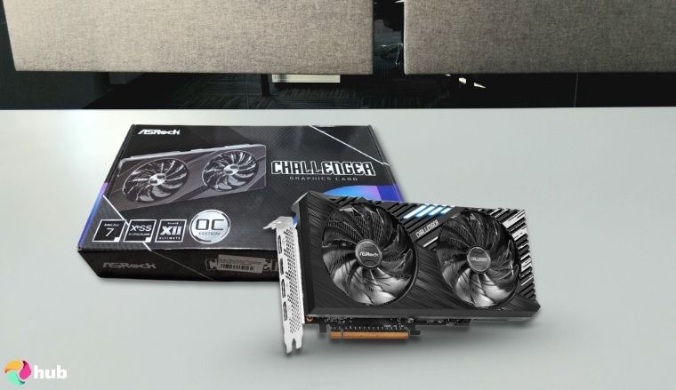 ASRock Intel Arc A750 Challenger SE GPU on a white office desk in a minimalist setup for a review