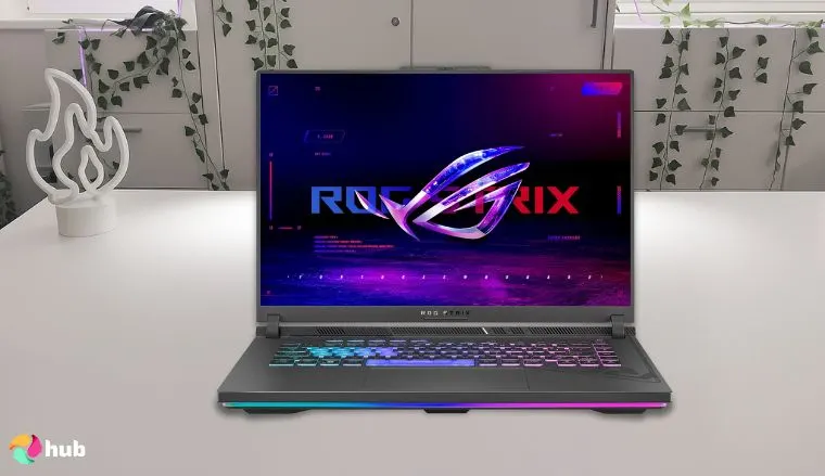 ASUS ROG Strix G16 165Hz Gaming Laptopon a white office desk in a clean setup for a review