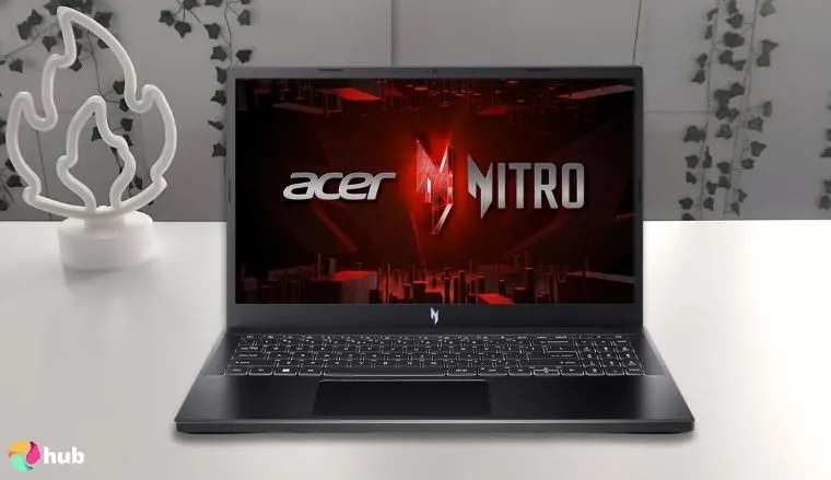 Acer Nitro V Gaming Laptop on a white office desk in a well-lit setting for a review