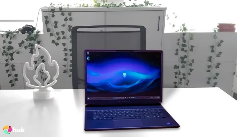 Alienware 16 Area-51 Laptop on a white office desk with natural shadows for a review