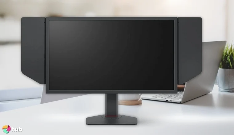 BenQ Zowie XL2546X Monitor on a white office desk in a well-lit setting for a review