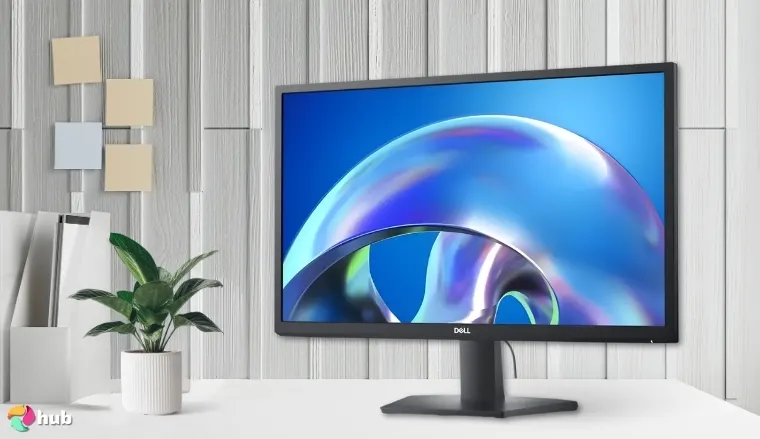 Dell 24 SE2425H Monitor on a white office desk with simple styling for a review