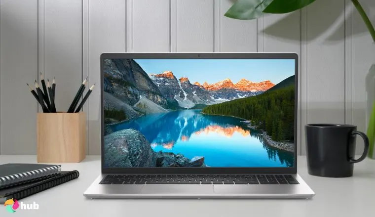 Dell Inspiron 3530 Laptop on a white office desk styled neatly for a review