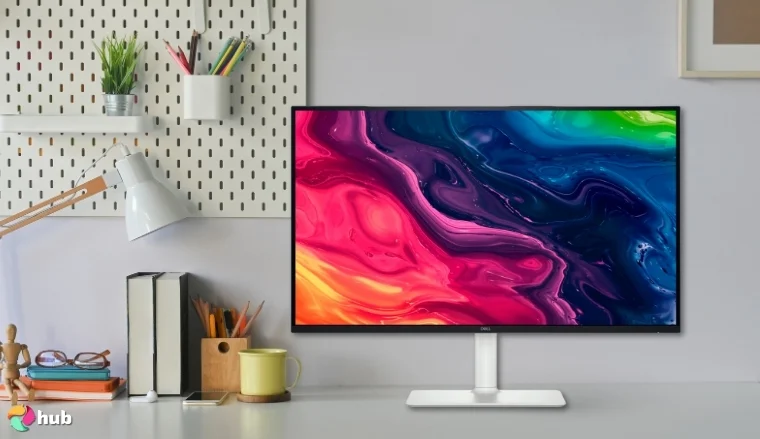 Dell S2725QS Monitor on a white office desk with creative arrangement for a review