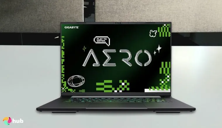 Gigabyte Aero X16 Copilot+ Gaming laptop on a white office desk in a top-down view for a review