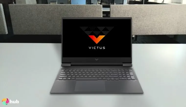 HP Victus 16 HP Gaming Laptop on a white office desk in a minimalist setup for a review