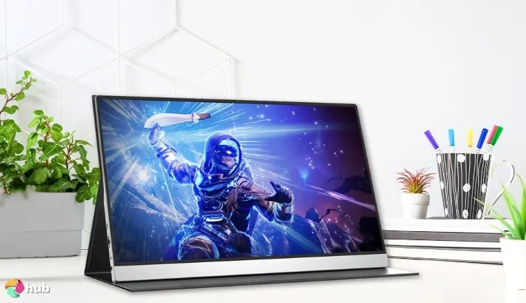 InnoView 2K 180Hz Portable Monitor on a white office desk with creative arrangement for a review