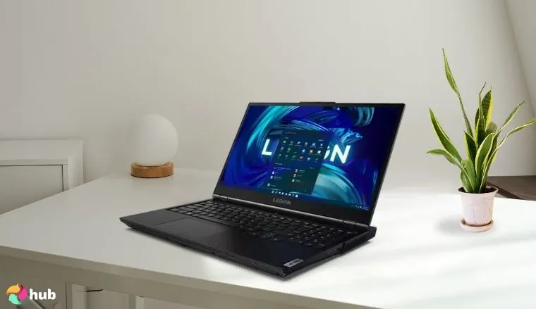 Lenovo Legion 5i Laptop on a white office desk in a minimalist setup for a review