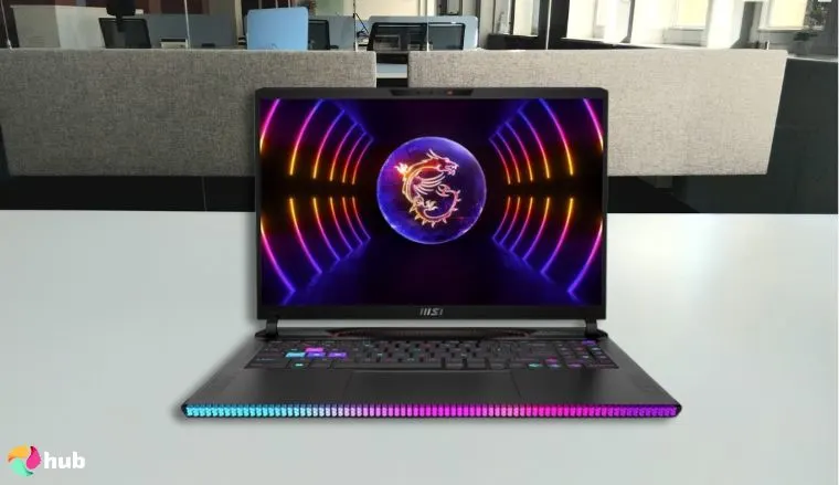 MSI Raider GE68HX gaming laptop on a white office desk in close-up for a review