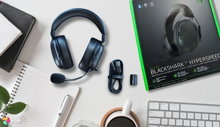 Razer BlackShark V2 HyperSpeed Headset on a white office desk arranged for a review