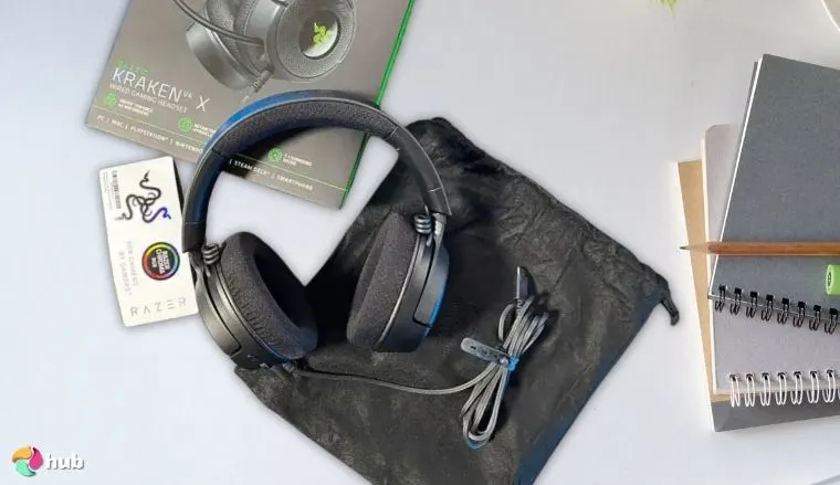 Razer Kraken V4 X Headset on a white office desk with creative arrangement for a review