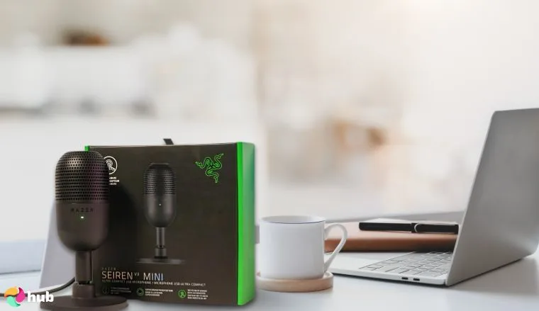 Razer Seiren V3 Mini Microphone on a white office desk in close-up for a review