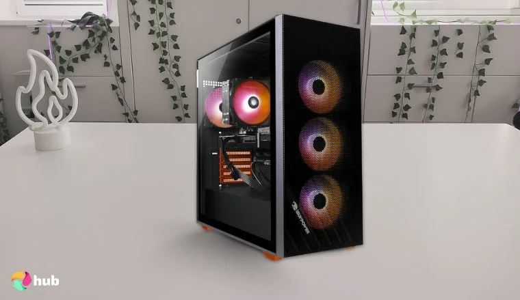 iBUYPOWER Scale Orange Gaming PC on a white office desk with an editorial style for a review