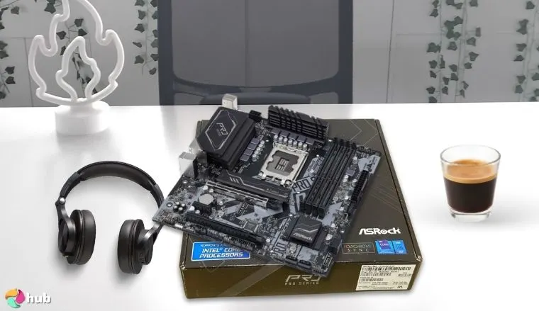 ASRock B660M Pro RS Motherboard on a white office desk in a bright workspace for a review
