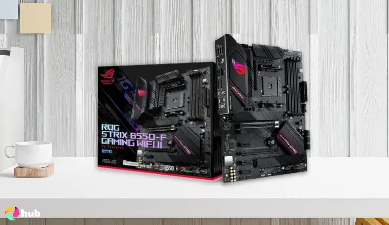 ASUS ROG Strix B550-F AMD Motherboard on a white office desk styled neatly for a review