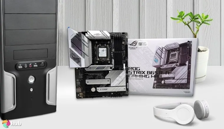 ASUS ROG Strix B650-A Motherboard on a white office desk with decorative items for a review