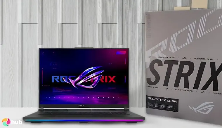 ASUS ROG Strix Scar 18 Laptop on a white office desk with simple styling for a review