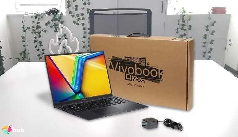 ASUS Vivobook Flip 16 Laptop on a white office desk with an uncluttered background for a review