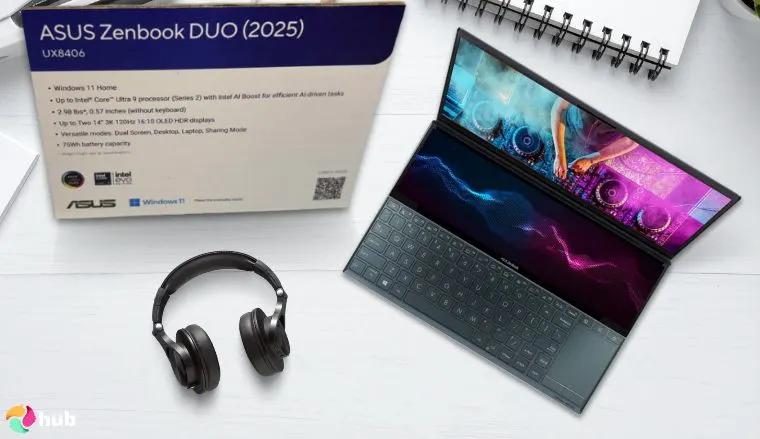 ASUS Zenbook DUO Laptop on a white office desk with creative arrangement for a review