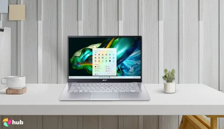 Acer Swift 14 Laptop on a white office desk with an editorial style for a review