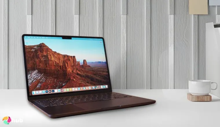 Apple MacBook Air (13 Inch, 2024) on a white office desk with soft lighting for a review