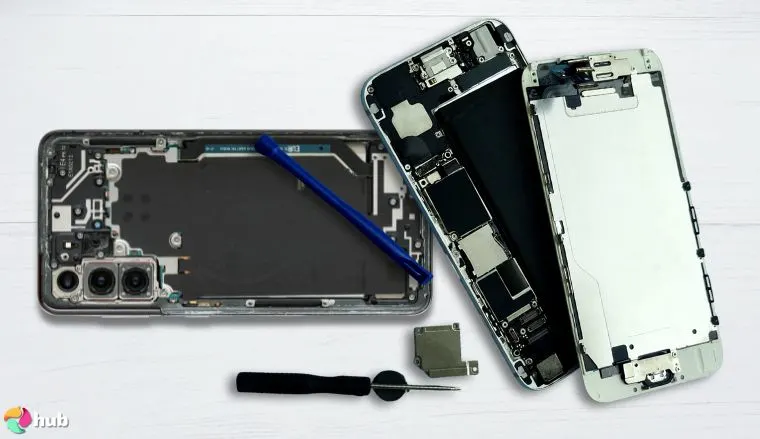 Samsung and Apple smartphones without back covers on a white office desk positioned for photography