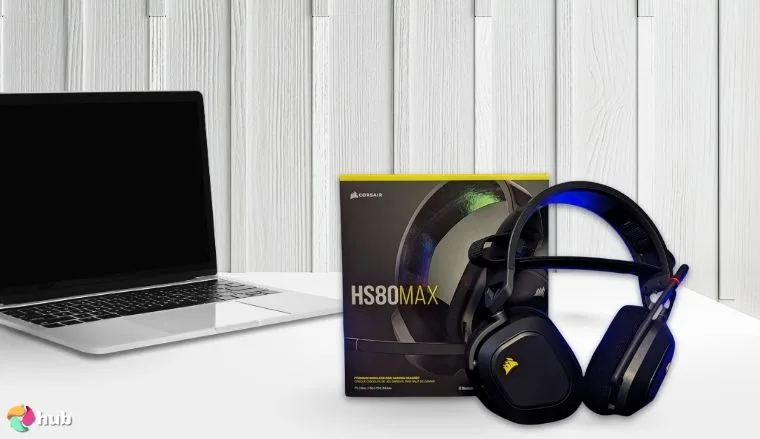 Corsair HS80 MAX Headset on a white office desk positioned for photography
