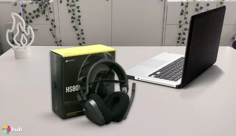 Corsair HS80 RGB Wireless Headset on a white office desk prepared for testing shots