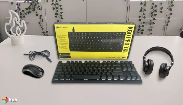 Corsair K60 RGB Tenkeyless Keyboard on a white office desk in a well-lit setting for a review