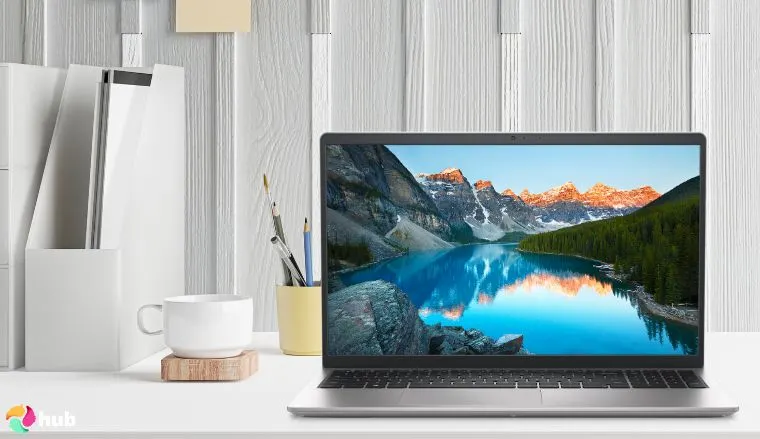 Dell 15 3530 Laptop on a white office desk with creative arrangement for a review