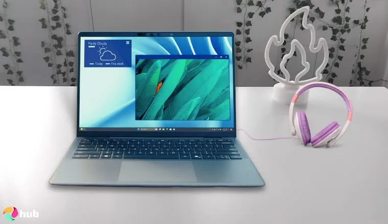 Dell Latitude 7455 Laptop on a white office desk with soft lighting for a review
