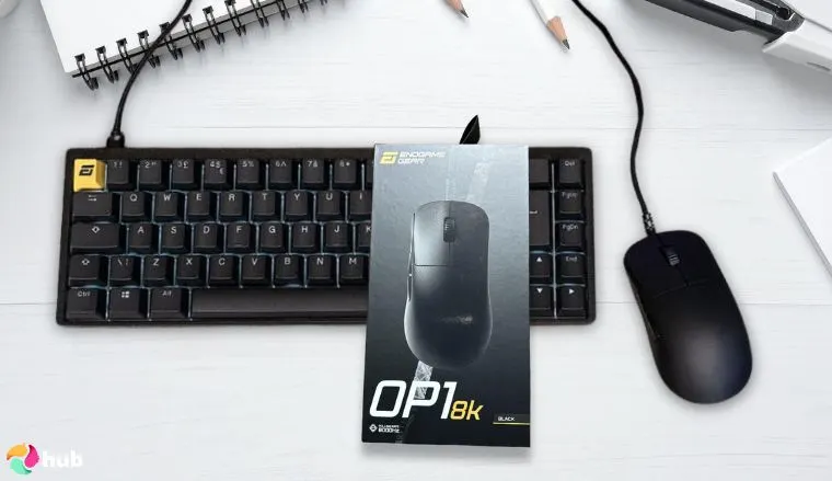 Endgame Gear OP1 8K Mouse on a white office desk in a top-down view for a review