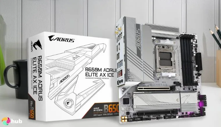 GIGABYTE B650M AORUS Elite AMD Motherboard on a white office desk in a top-down view for a review