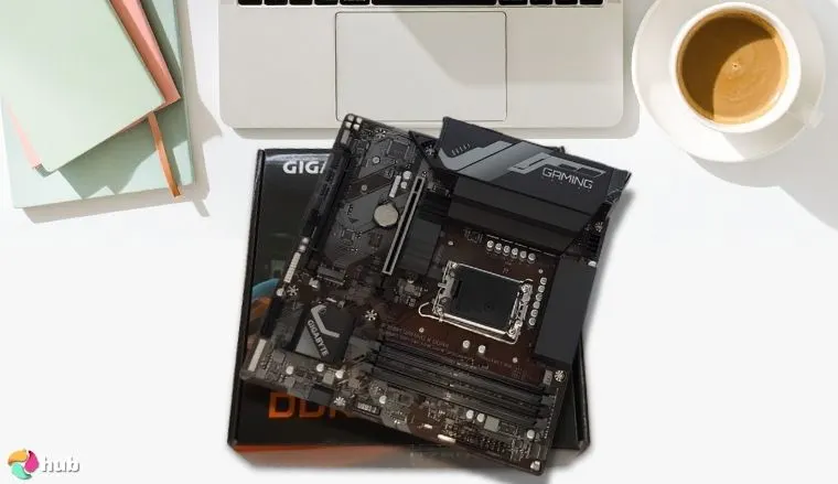 GIGABYTE B760M Gaming Plus WiFi DDR4 Motherboard on a white office desk in close-up for a review