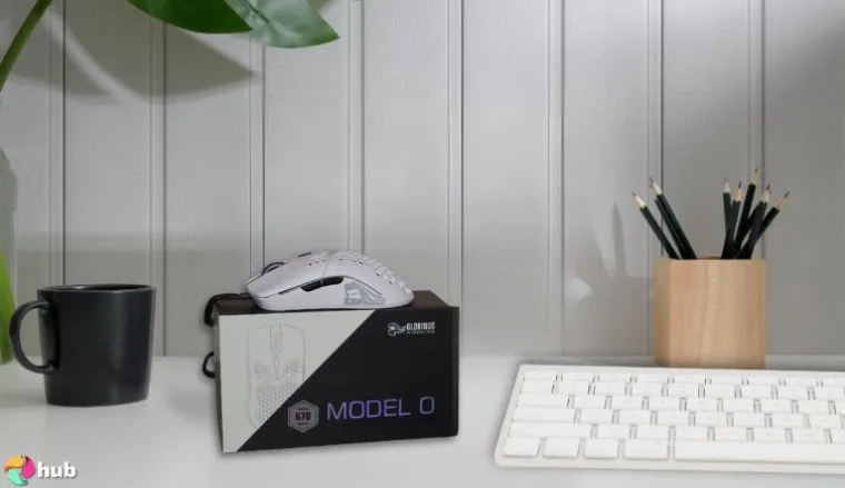 Glorious Model O Mouse on a white office desk prepared for testing shots