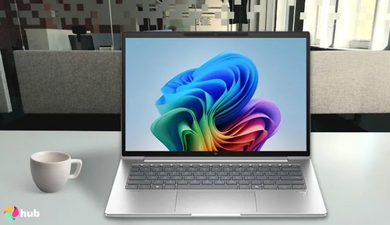 HP OmniBook Snapdragon Laptop on a white office desk with an editorial style for a review