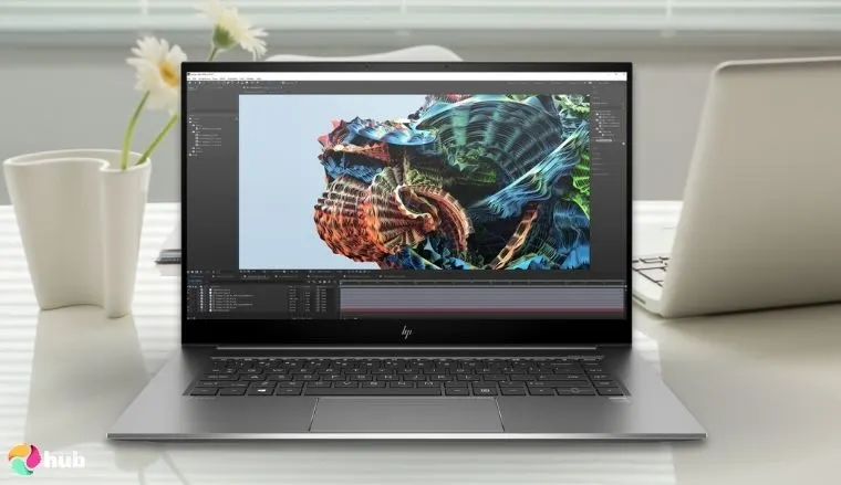 HP ZBook Studio Mobile Workstation Laptop on a white office desk styled for promotional review