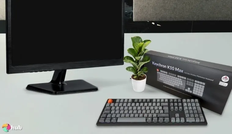 Keychron K10 Max Keyboard on a white office desk with minimal decor for a review