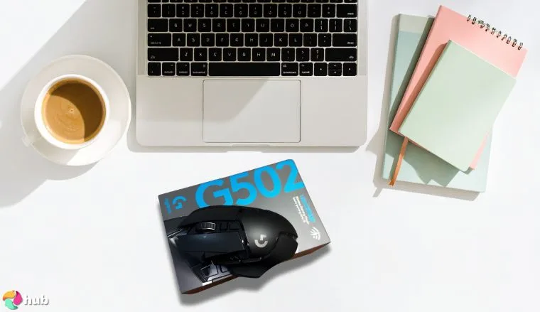 Logitech G502 X LIGHTSPEED Mouse on a white office desk styled neatly for a review