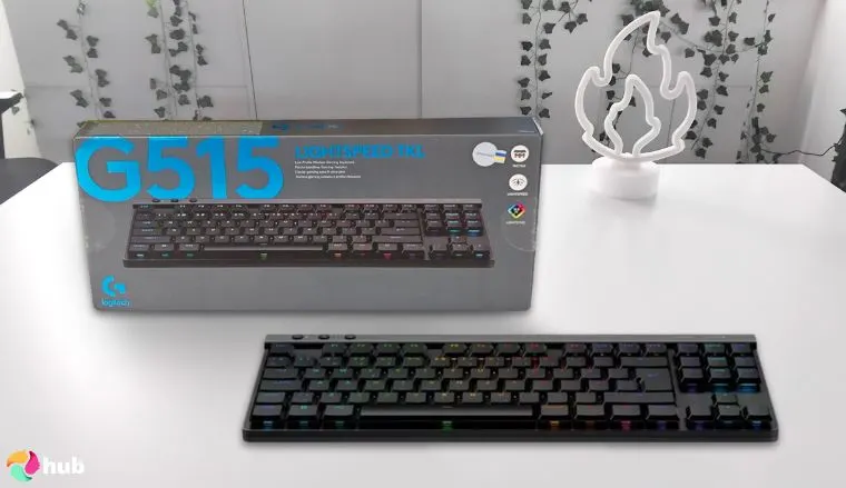 Logitech G515 Wireless Keyboard on a white office desk with decorative items for a review