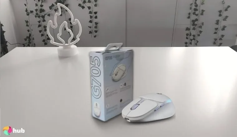 Logitech G705 Wireless Gaming Mouse on a white office desk with an uncluttered background for a review
