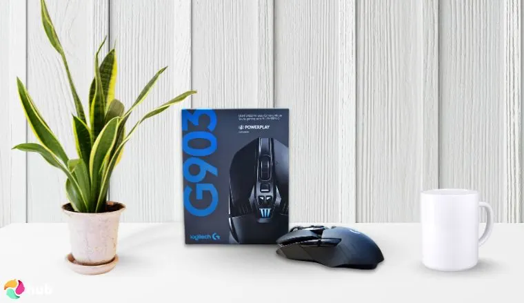Logitech G903 LIGHTSPEED Wireless Gaming Mouse W on a white office desk in a clean setup for a review