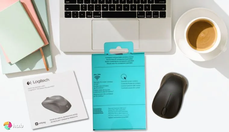 Logitech M317 Mouse on a white office desk prepared for testing shots